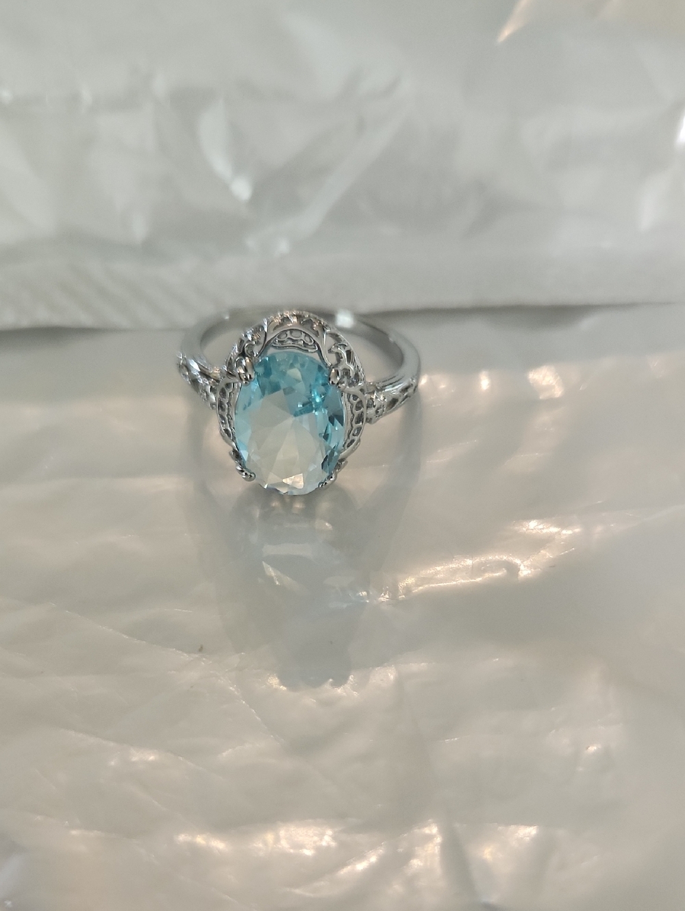 Sterling Silver Blue Topaz Oval Ring - Elegant Blue Gem
